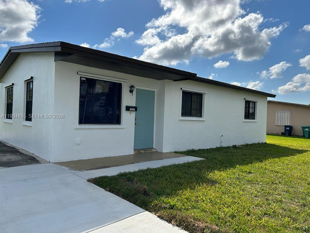 14735 Southwest 107th Avenue Miami, FL 33176 - Photo 1 of 9 a backyard of a house