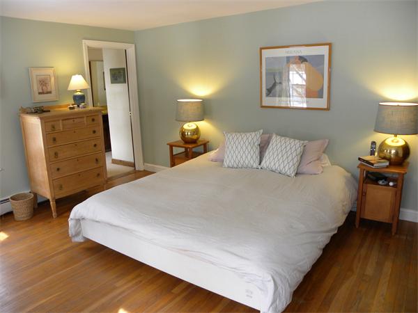 82 Ortins Road Hamilton, MA 01982 - Photo 11 of 25 a bedroom with bed and wooden floor