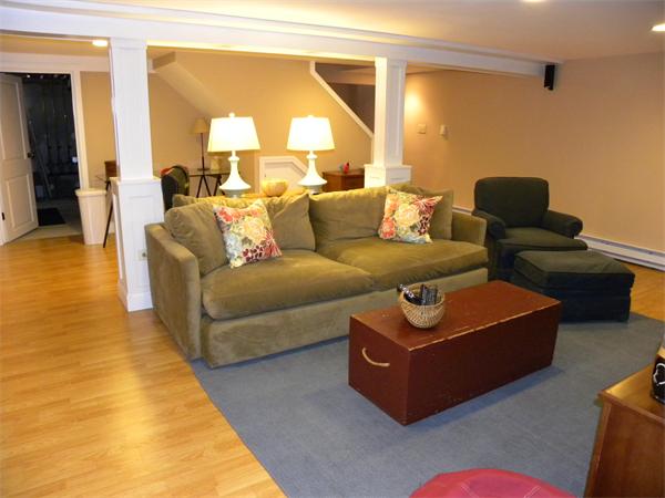 82 Ortins Road Hamilton, MA 01982 - Photo 23 of 25 a living room with furniture and a large window