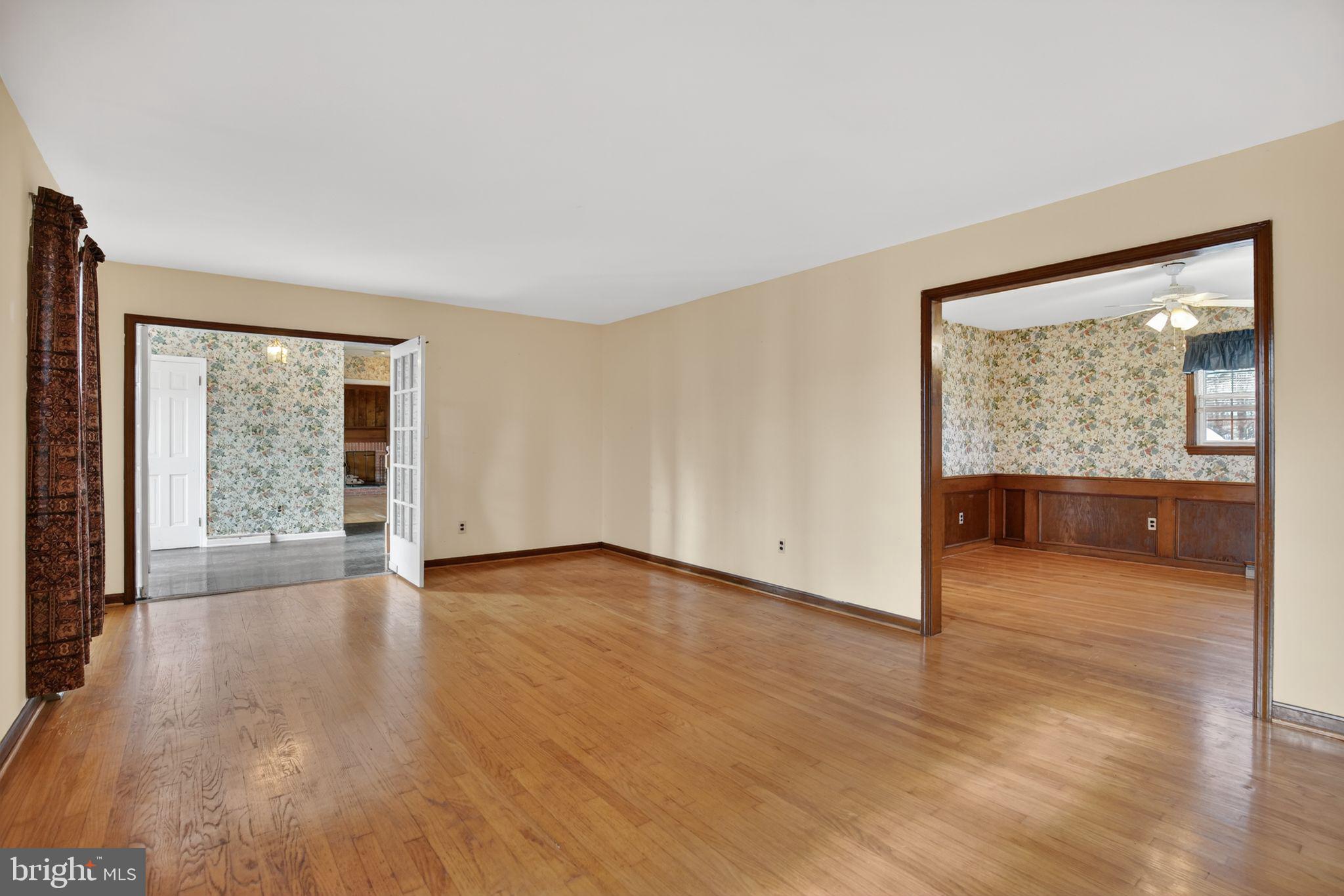 7146 Leonardtown Road Hughesville, MD 20637 - Photo 13 of 34 an empty room with wooden floor and windows