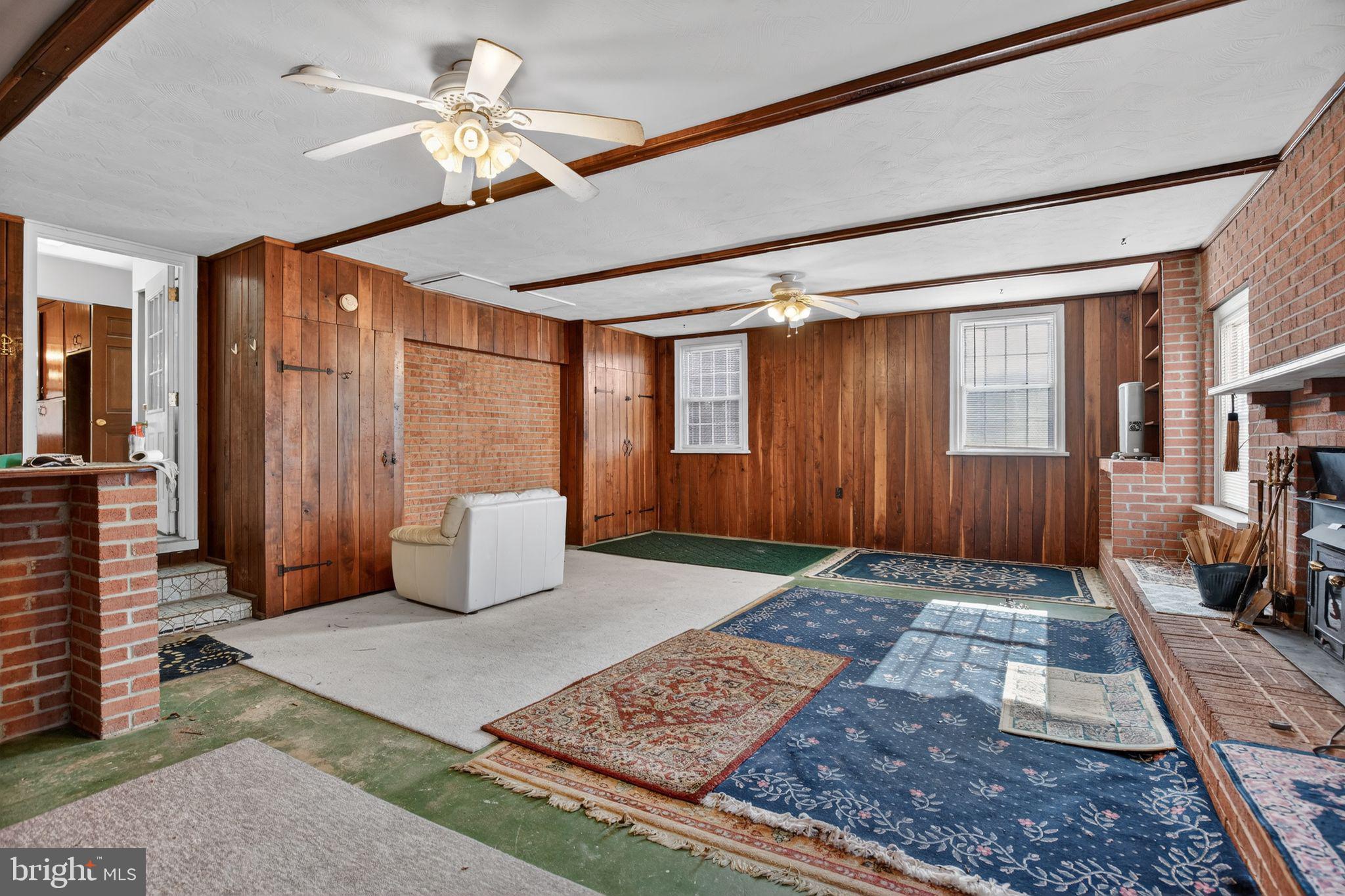 7146 Leonardtown Road Hughesville, MD 20637 - Photo 18 of 34 a living room with couch