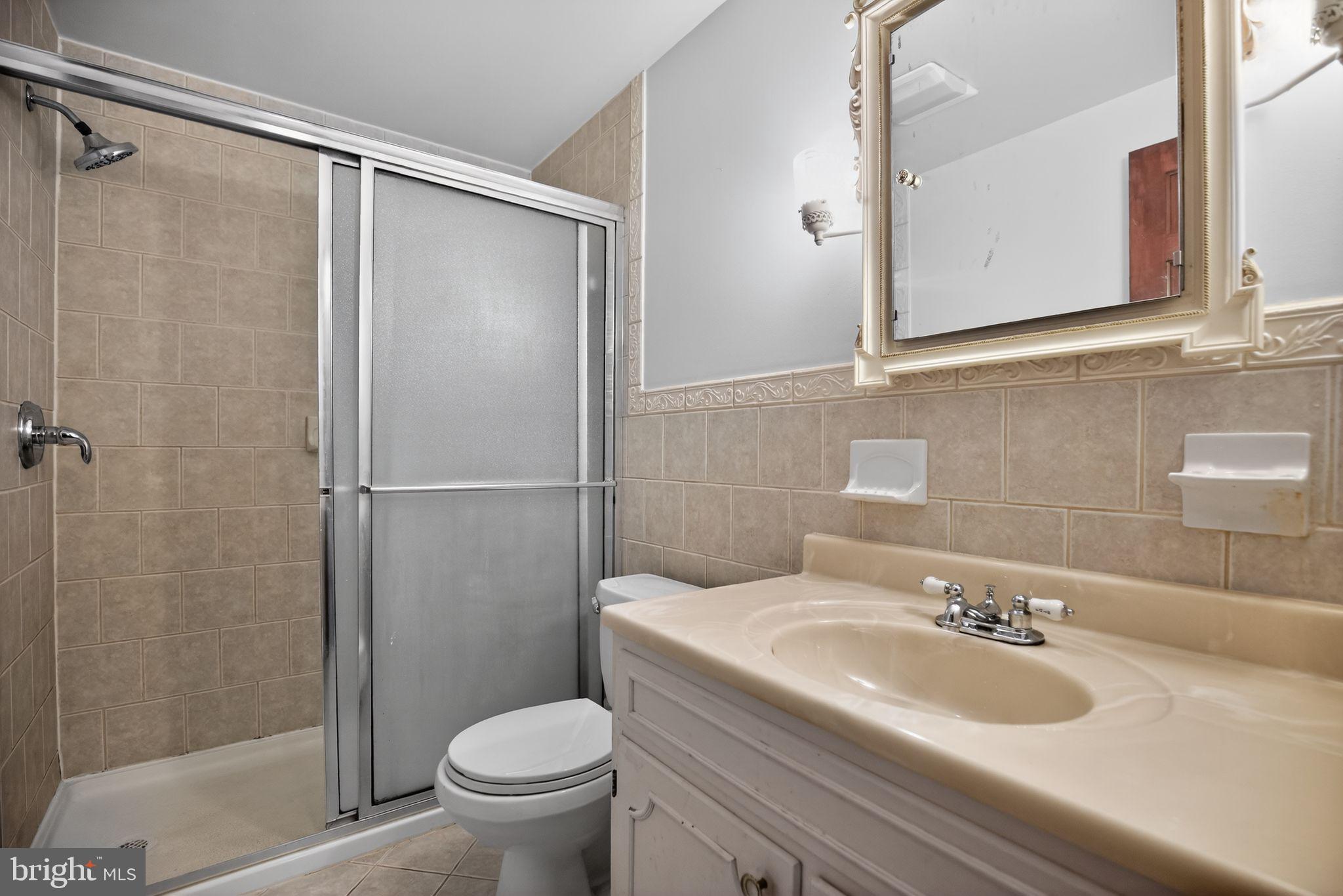 7146 Leonardtown Road Hughesville, MD 20637 - Photo 28 of 34 a bathroom with a sink and a toilet