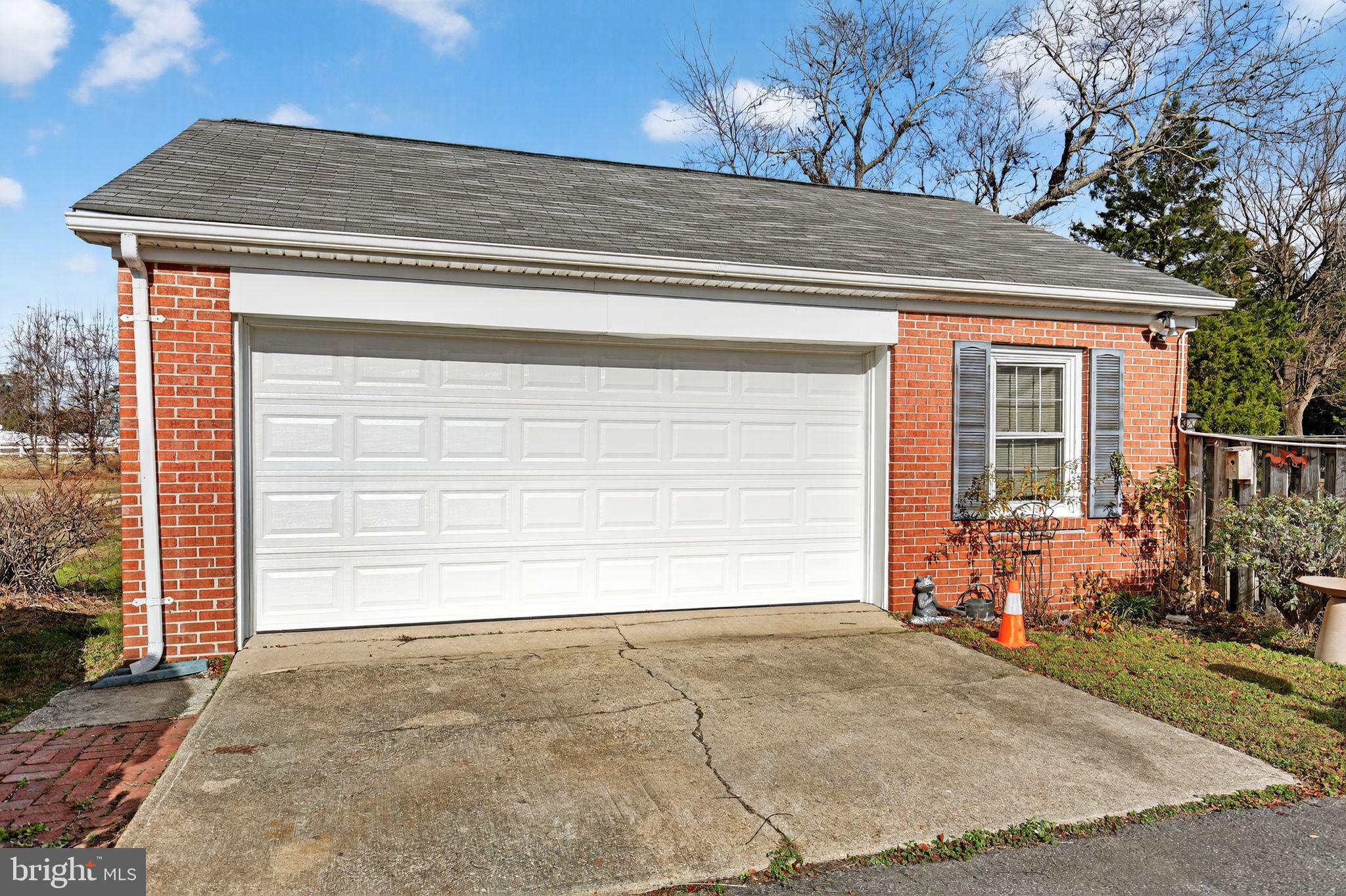7146 Leonardtown Road Hughesville, MD 20637 - Photo 9 of 34 a view of a house with a garage