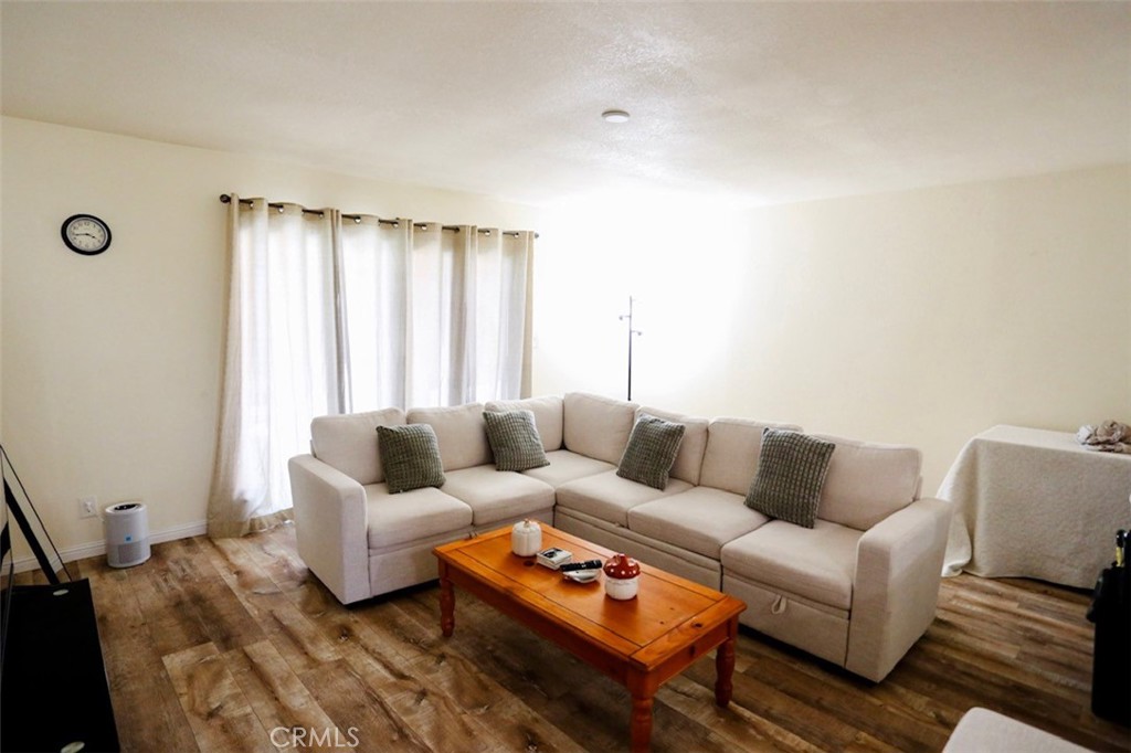 1050 Athena Court Riverside, CA 92507 - Photo 3 of 9 a living room with furniture and a window