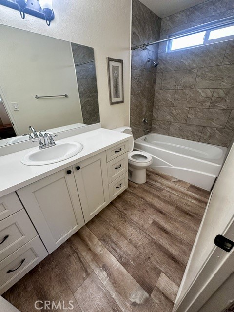 1050 Athena Court Riverside, CA 92507 - Photo 5 of 12 a bathroom with a double vanity sink toilet and shower