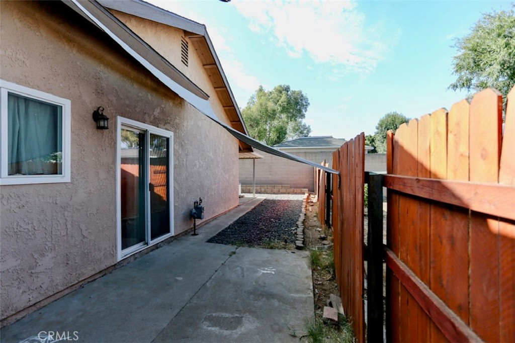1050 Athena Court Riverside, CA 92507 - Photo 6 of 9 a view of a house with a backyard