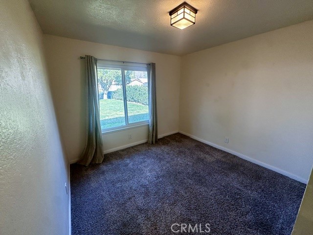 1050 Athena Court Riverside, CA 92507 - Photo 9 of 12 an empty room with a window