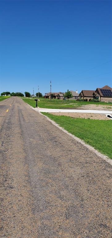 104 Anderson Road Waxahachie, TX 75167 - Photo 5 of 10 a view of an outdoor space and yard