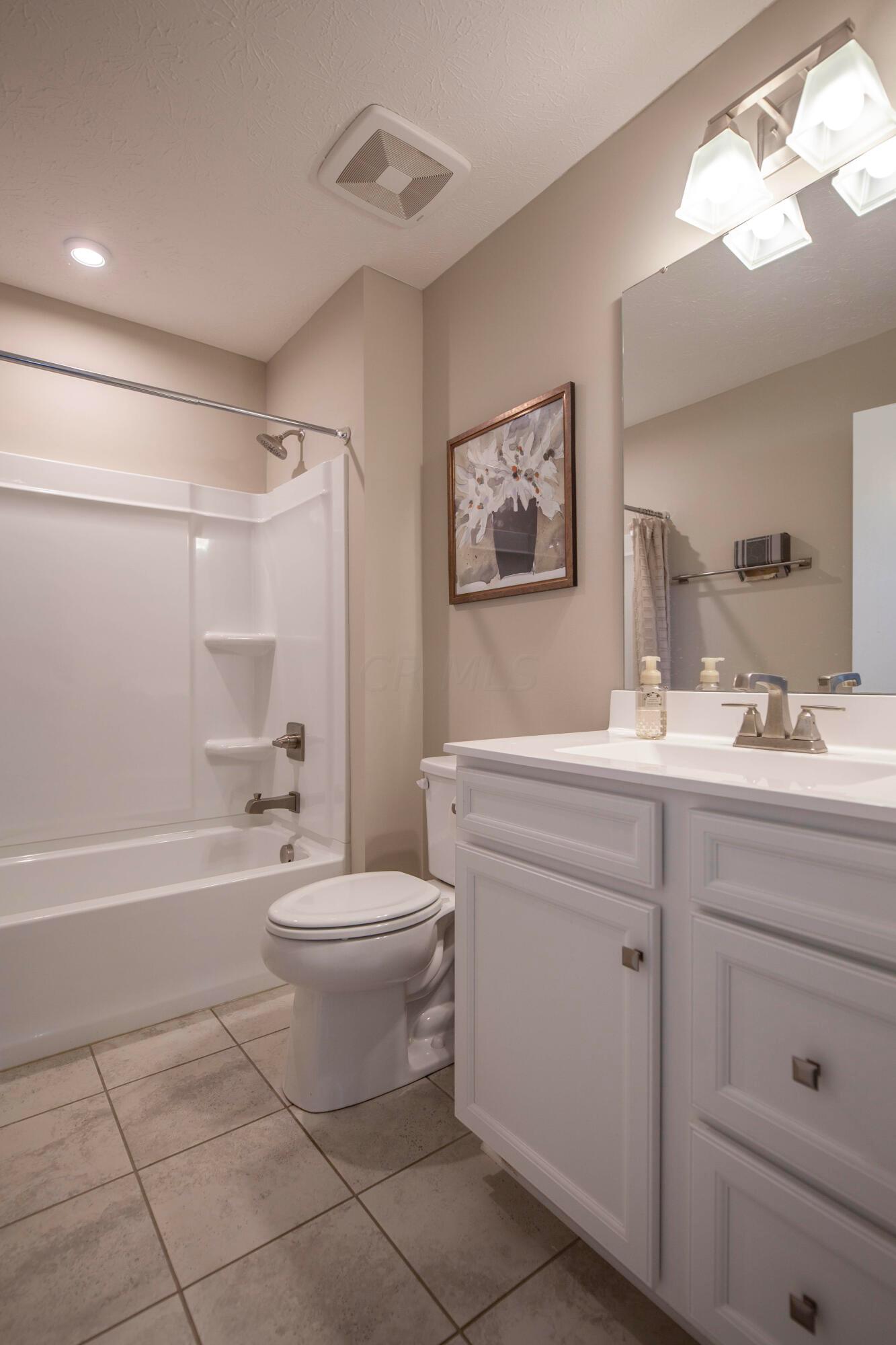 97 Firenze Road Delaware, OH 43015 - Photo 21 of 30 the 2nd full bathroom is located near the front of the property between the two additional bedrooms.