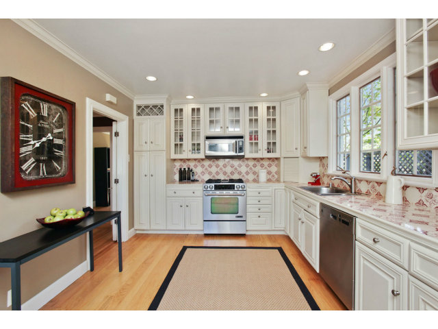 1132 Cambridge Road Burlingame, CA 94010 - Photo 11 of 25 a kitchen with stainless steel appliances granite countertop a refrigerator and a stove top oven