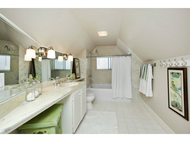 1132 Cambridge Road Burlingame, CA 94010 - Photo 15 of 25 a bathroom with a double vanity sink and a mirror