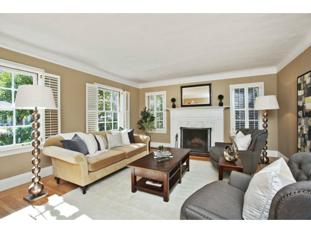 1132 Cambridge Road Burlingame, CA 94010 - Photo 5 of 25 a living room with furniture and a fireplace