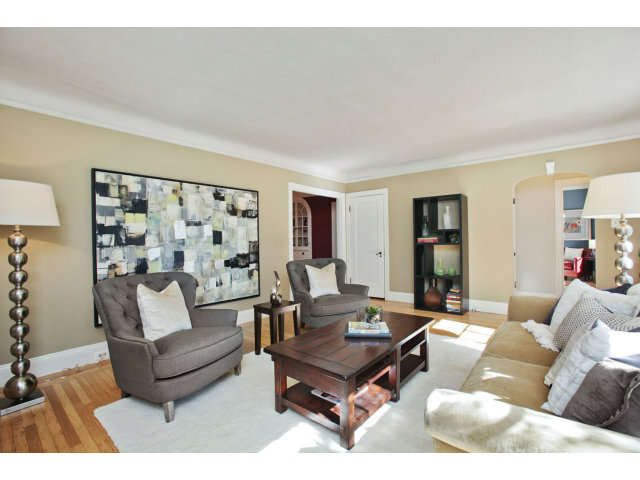 1132 Cambridge Road Burlingame, CA 94010 - Photo 6 of 25 a living room with furniture and a large window