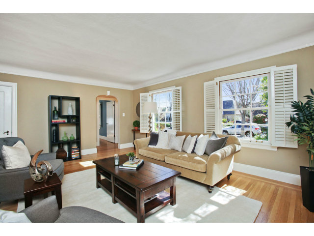 1132 Cambridge Road Burlingame, CA 94010 - Photo 7 of 25 a living room with furniture and a large window