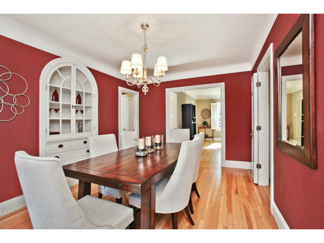 1132 Cambridge Road Burlingame, CA 94010 - Photo 9 of 25 a view of a dining room with furniture and a chandelier