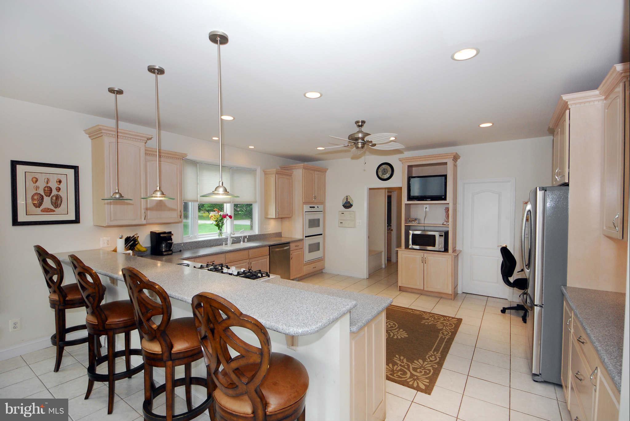 464 Cedar Haven Road Arnold, MD 21012 - Photo 10 of 28 Kitchen has maple cabinets & Corian counters