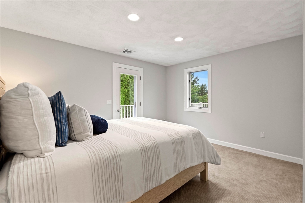 53 Gerald Road Marblehead, MA 01945 - Photo 26 of 42 a bedroom with two beds and a window