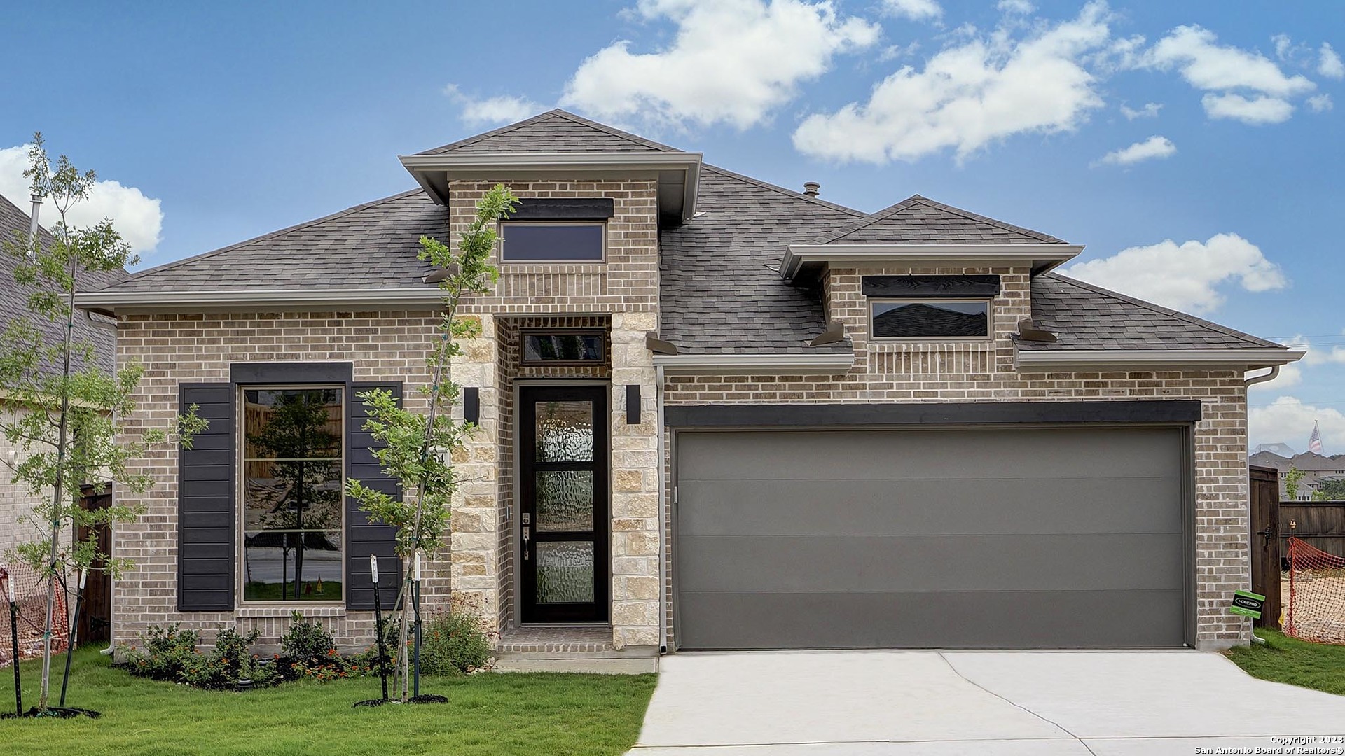 2154 Knippa San Antonio, TX 78253 - Photo 1 of 1 a front view of a house with a yard