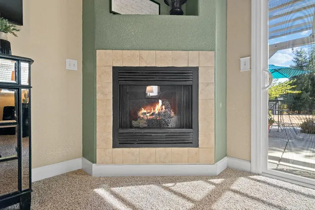 a large bathroom with a tub and sink
