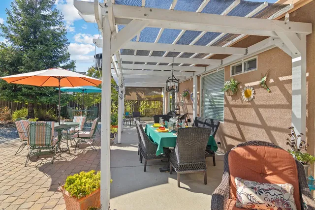 a view of a yard with a tree