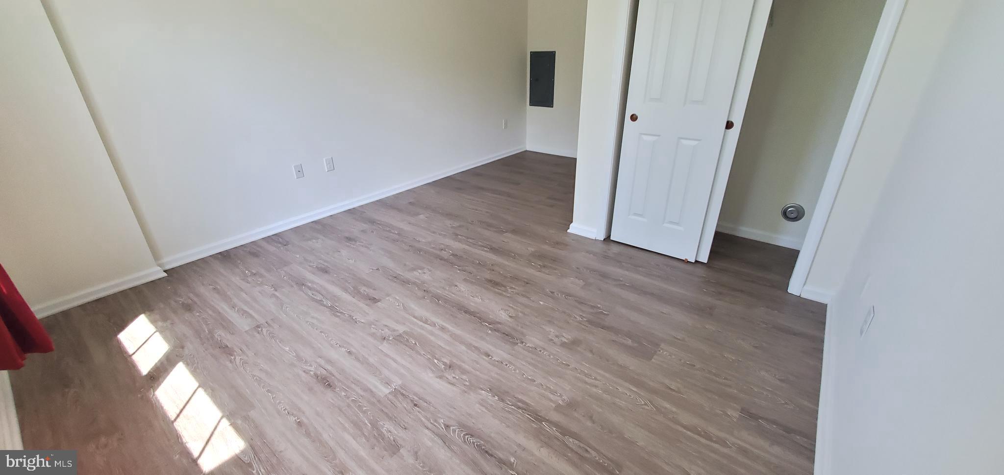 615 Timberlake Drive Ewing, NJ 08618 - Photo 13 of 22 an empty room with wooden floor