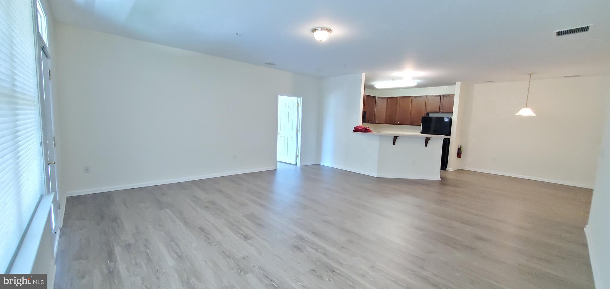 615 Timberlake Drive Ewing, NJ 08618 - Photo 5 of 22 a view of a kitchen with a sink and a refrigerator