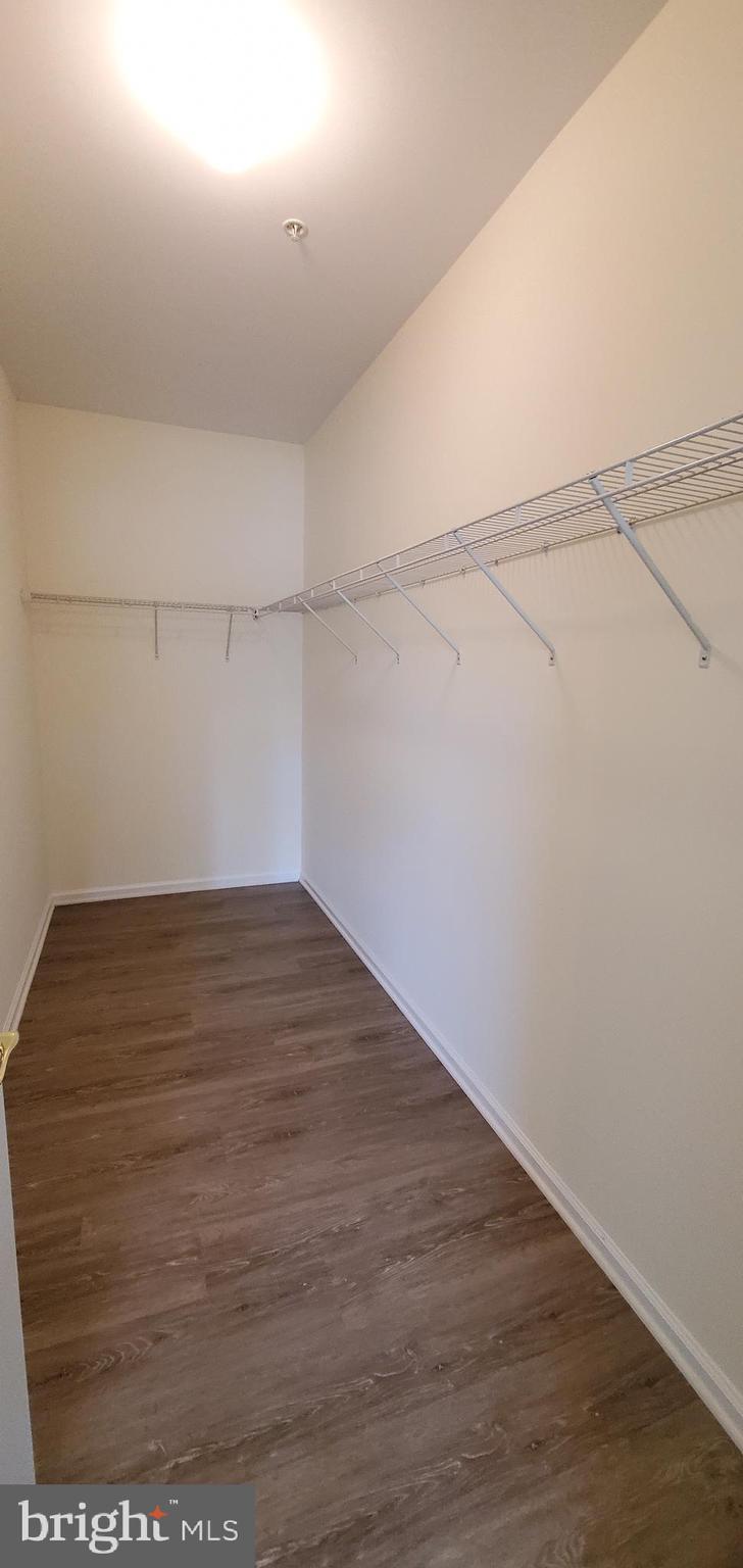 615 Timberlake Drive Ewing, NJ 08618 - Photo 10 of 22 a view of a room with racks on the wall