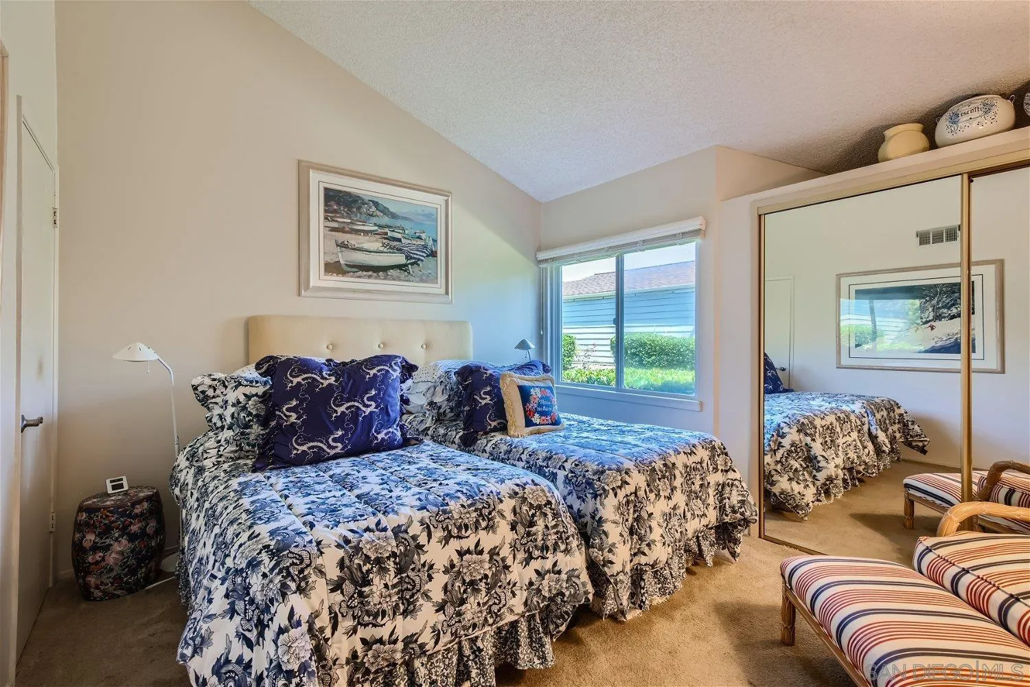 1812 Wilton Road Encinitas, CA 92024 - Photo 12 of 26 a bed room with two beds and a large mirror