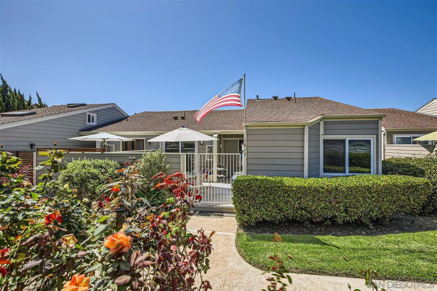 1812 Wilton Road Encinitas, CA 92024 - Photo 2 of 26 a front view of a house with a yard
