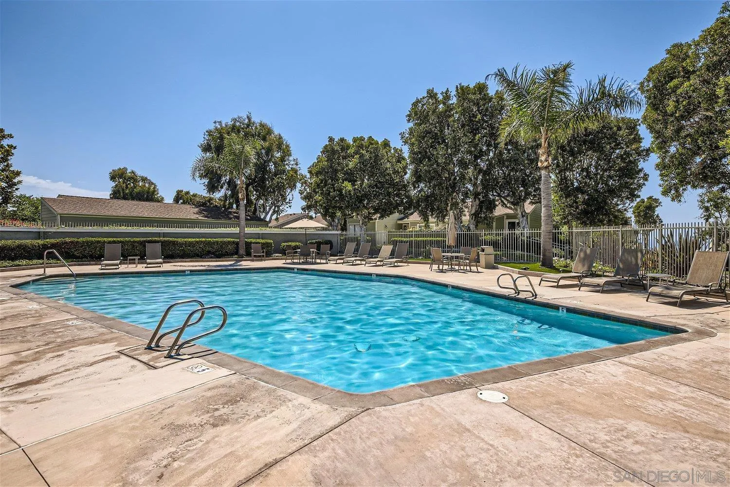 1812 Wilton Road Encinitas, CA 92024 - Photo 21 of 26 a view of swimming pool with outdoor seating and yard in the back