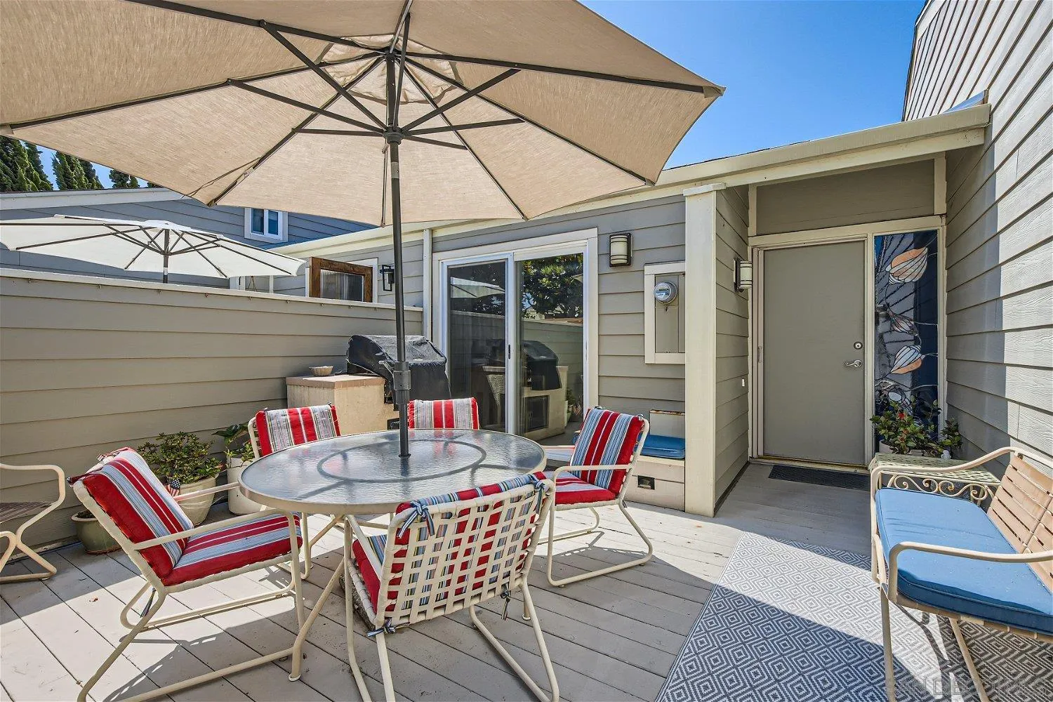 1812 Wilton Road Encinitas, CA 92024 - Photo 7 of 26 a patio with a table and chairs