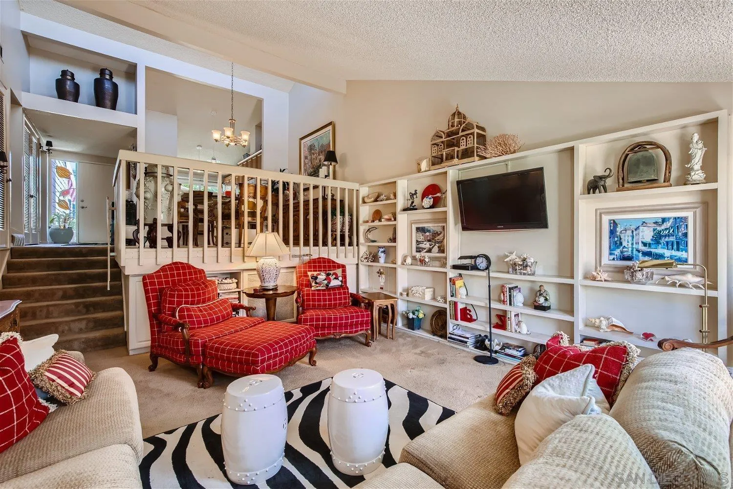 1812 Wilton Road Encinitas, CA 92024 - Photo 8 of 26 a living room with furniture and a flat screen tv