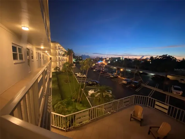 a view of a living room with a large window