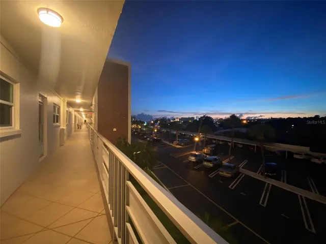 a bedroom with a bed and a table in it