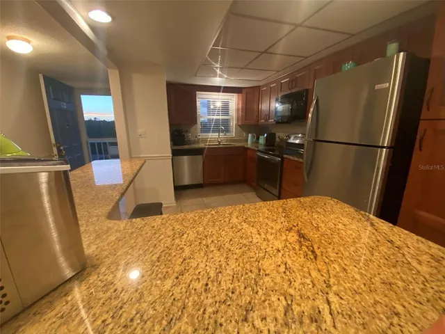 a view of a door and a window