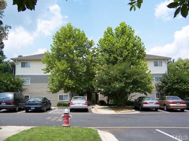 303 Smith Level Road, Unit D23 Chapel Hill, NC 27516 - Photo 1 of 3 a view of street with parked cars