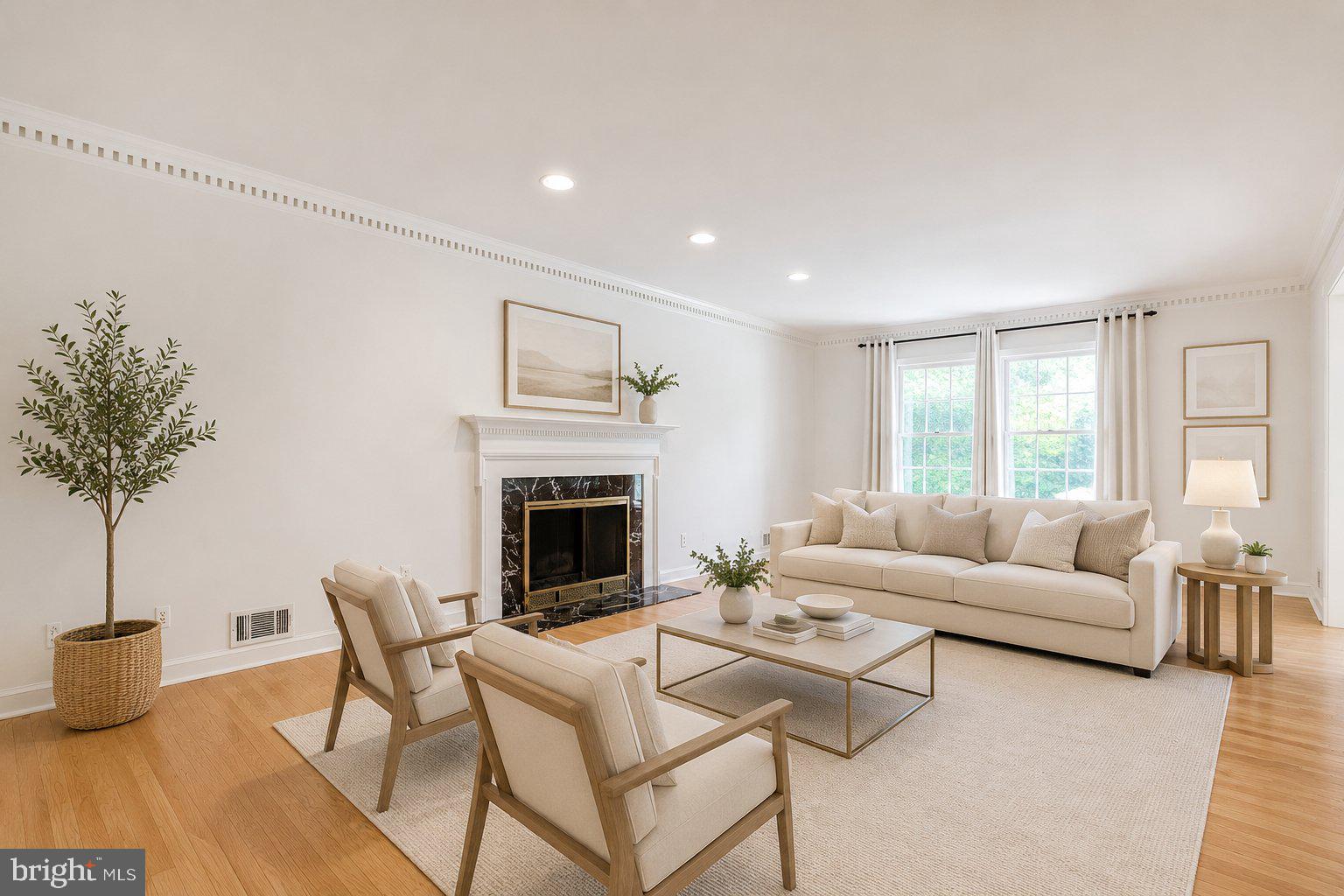8500 Brook Road McLean, VA 22102 - Photo 5 of 59 a living room with furniture a table and a potted plant