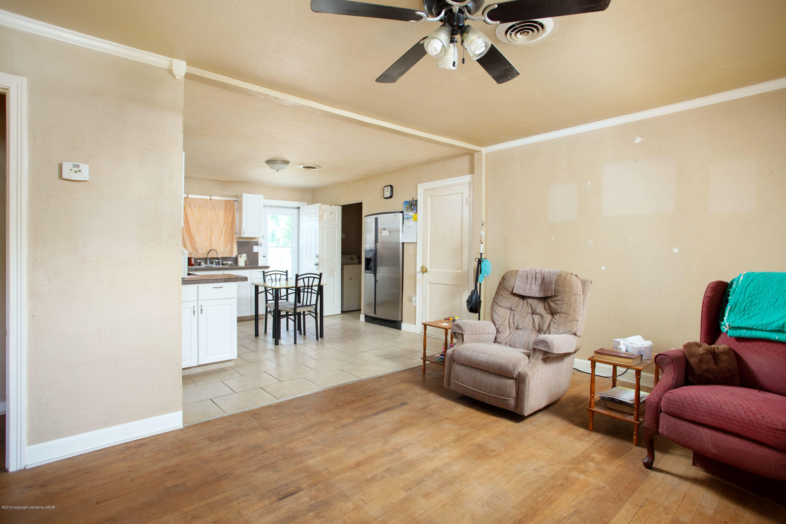 4210 South Hughes Street Amarillo, TX 79110 - Photo 11 of 18 Kitchen/dining from living area view