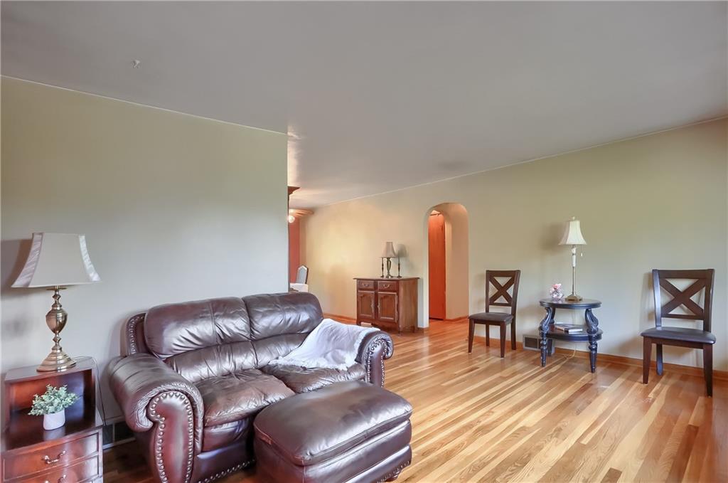 210 Craig Street Rochester, PA 15074 - Photo 5 of 48 a living room with furniture and a wooden floor