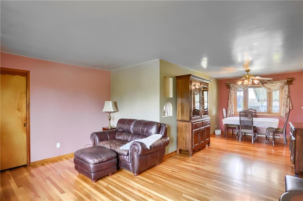 210 Craig Street Rochester, PA 15074 - Photo 8 of 48 a living room with furniture and wooden floor