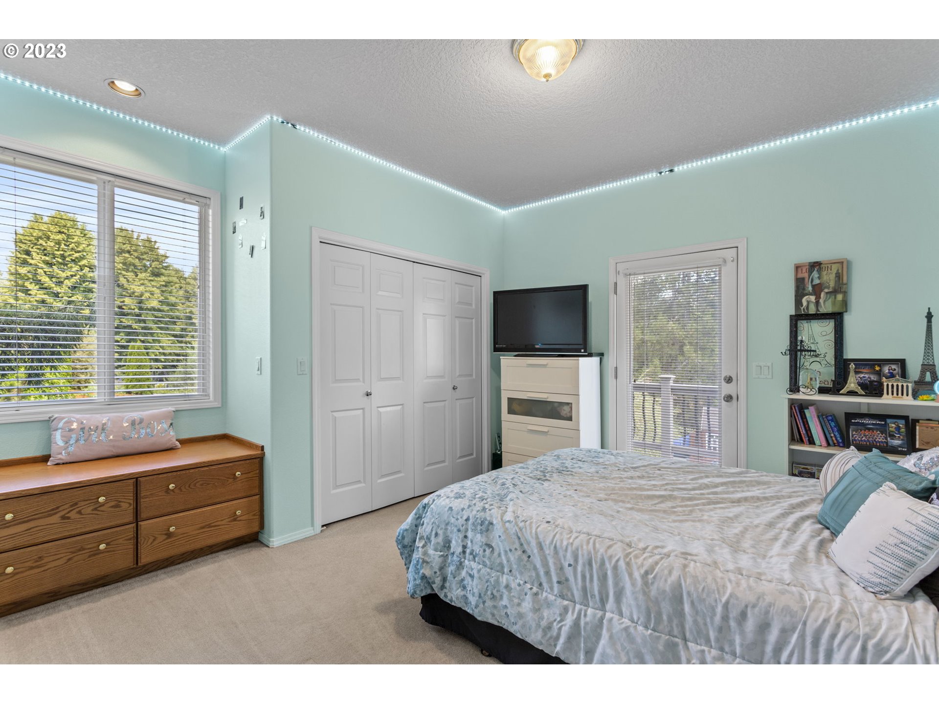 3064 South 23rd Way Ridgefield, WA 98642 - Photo 19 of 29 a bedroom with a bed and a large window