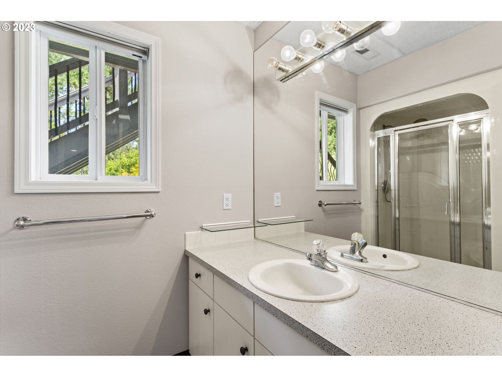 3064 South 23rd Way Ridgefield, WA 98642 - Photo 29 of 29 a bathroom with a sink and a mirror