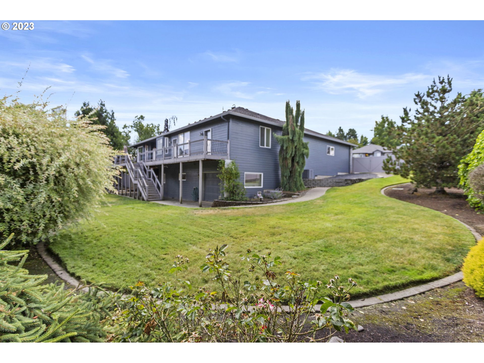 3064 South 23rd Way Ridgefield, WA 98642 - Photo 4 of 29 a view of a house with a swimming pool