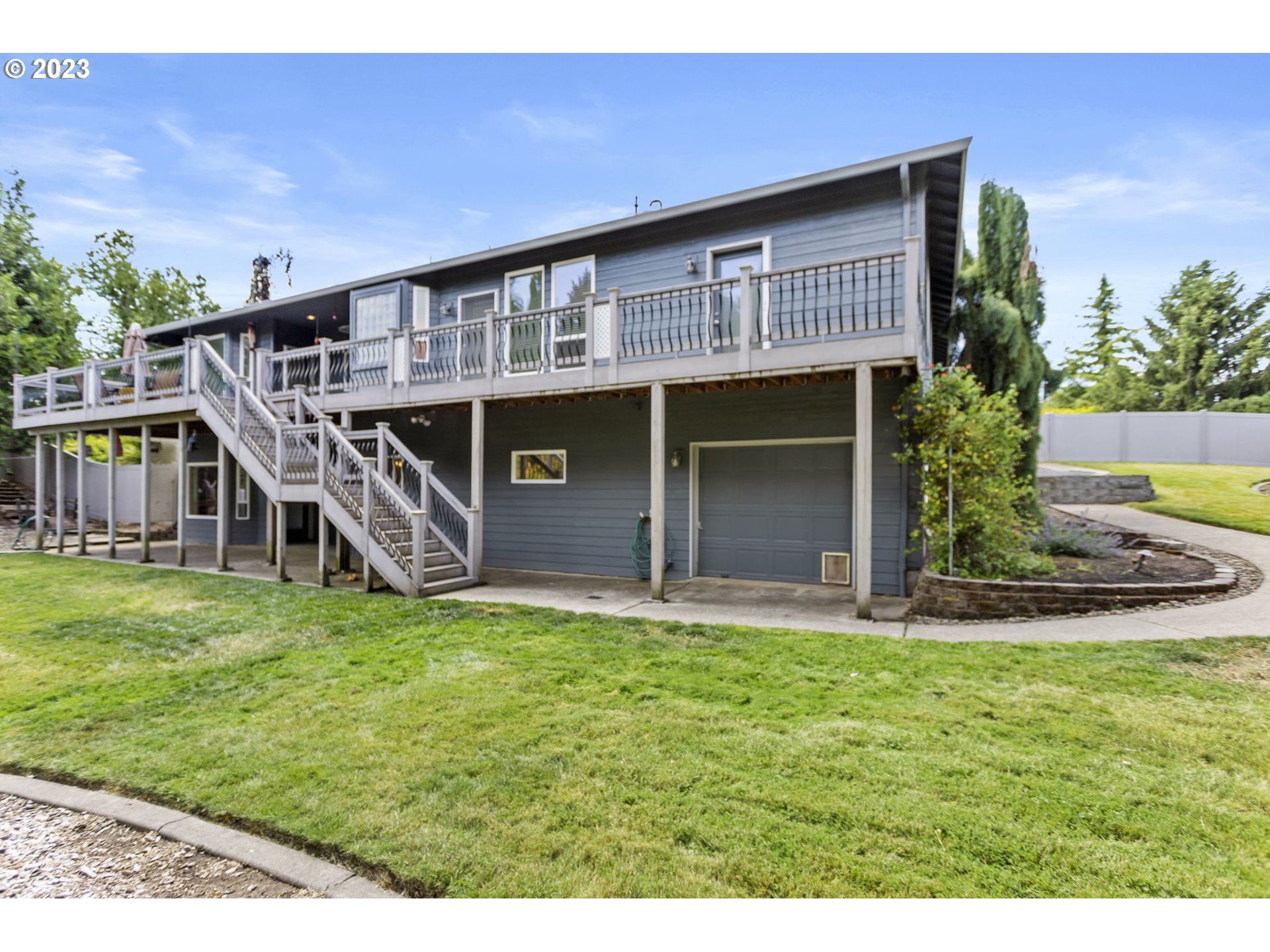 3064 South 23rd Way Ridgefield, WA 98642 - Photo 5 of 29 a view of a house with a yard and sitting area