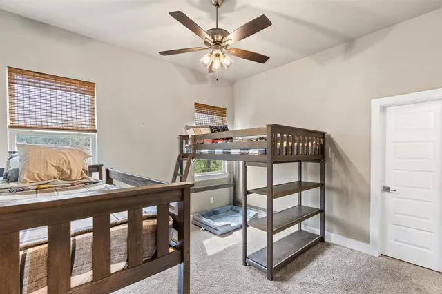 a bedroom with furniture