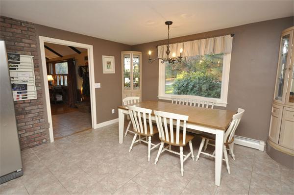 4 Wilmor Road Topsfield, MA 01983 - Photo 11 of 29 a view of a dining room with furniture window and wooden floor