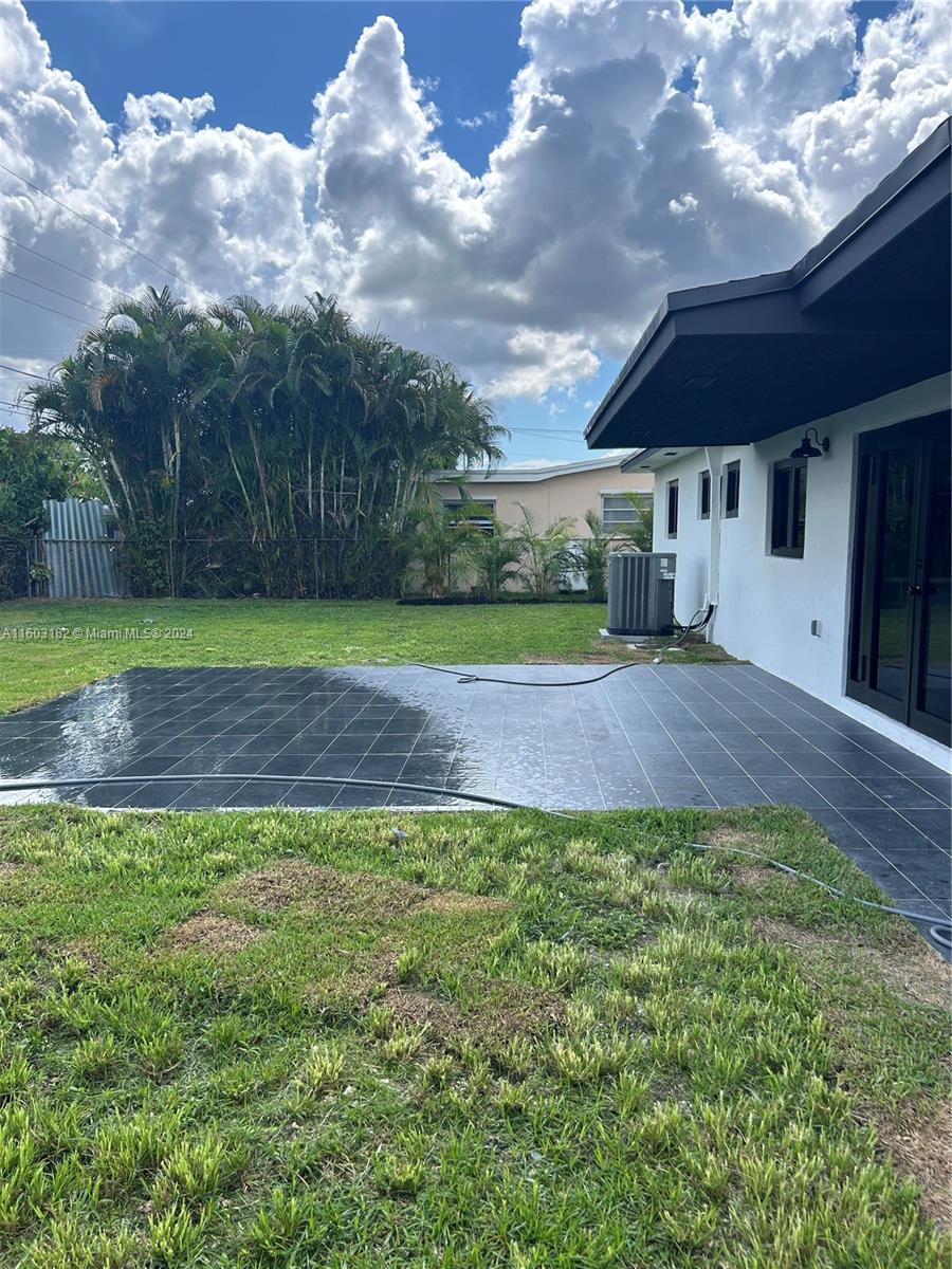 Westchester Miami, FL 33165 - Photo 14 of 14 a view of a house with a yard