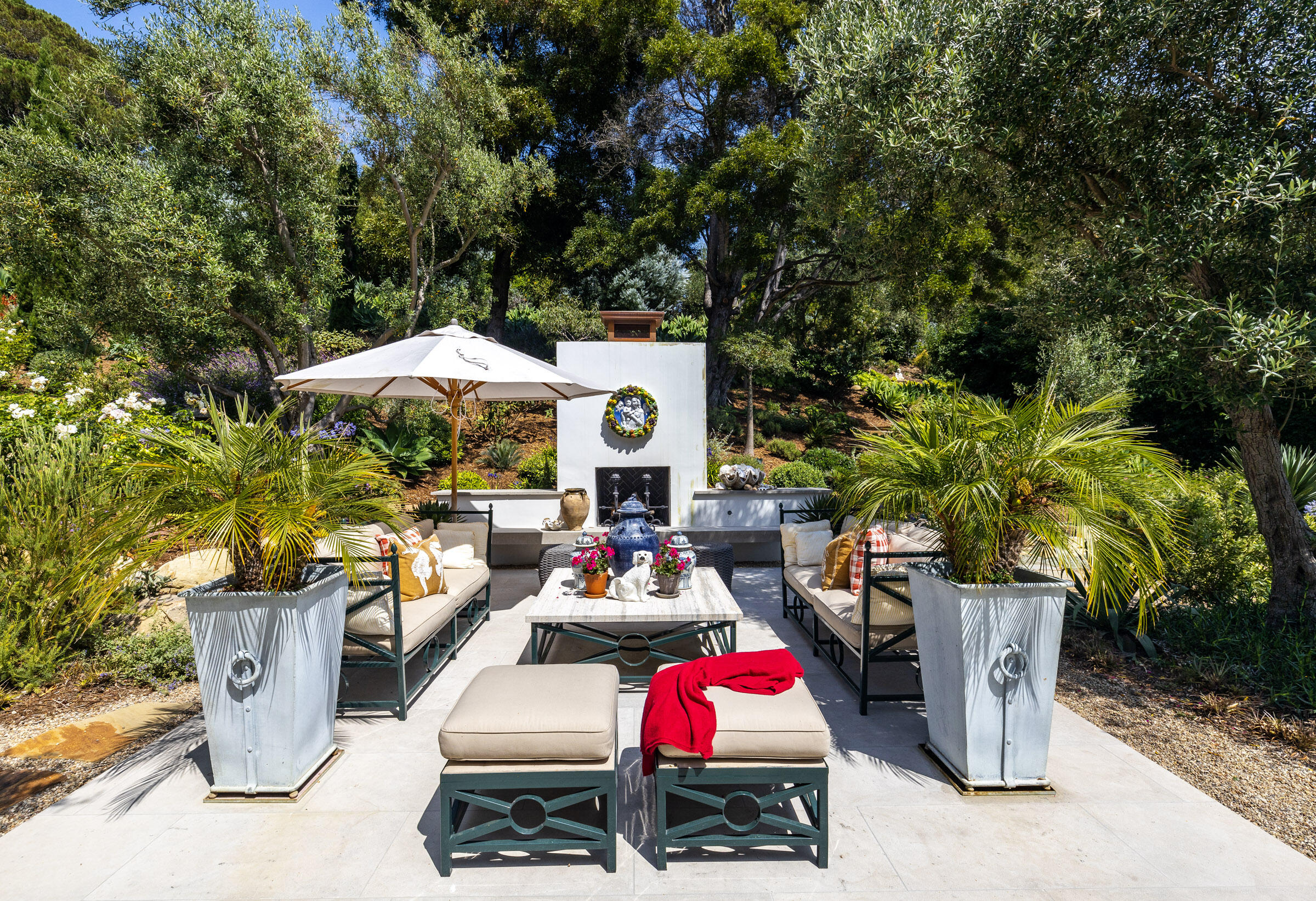 448 Court Place Montecito, CA 93108 - Photo 23 of 33 an outdoor space with furniture and umbrella