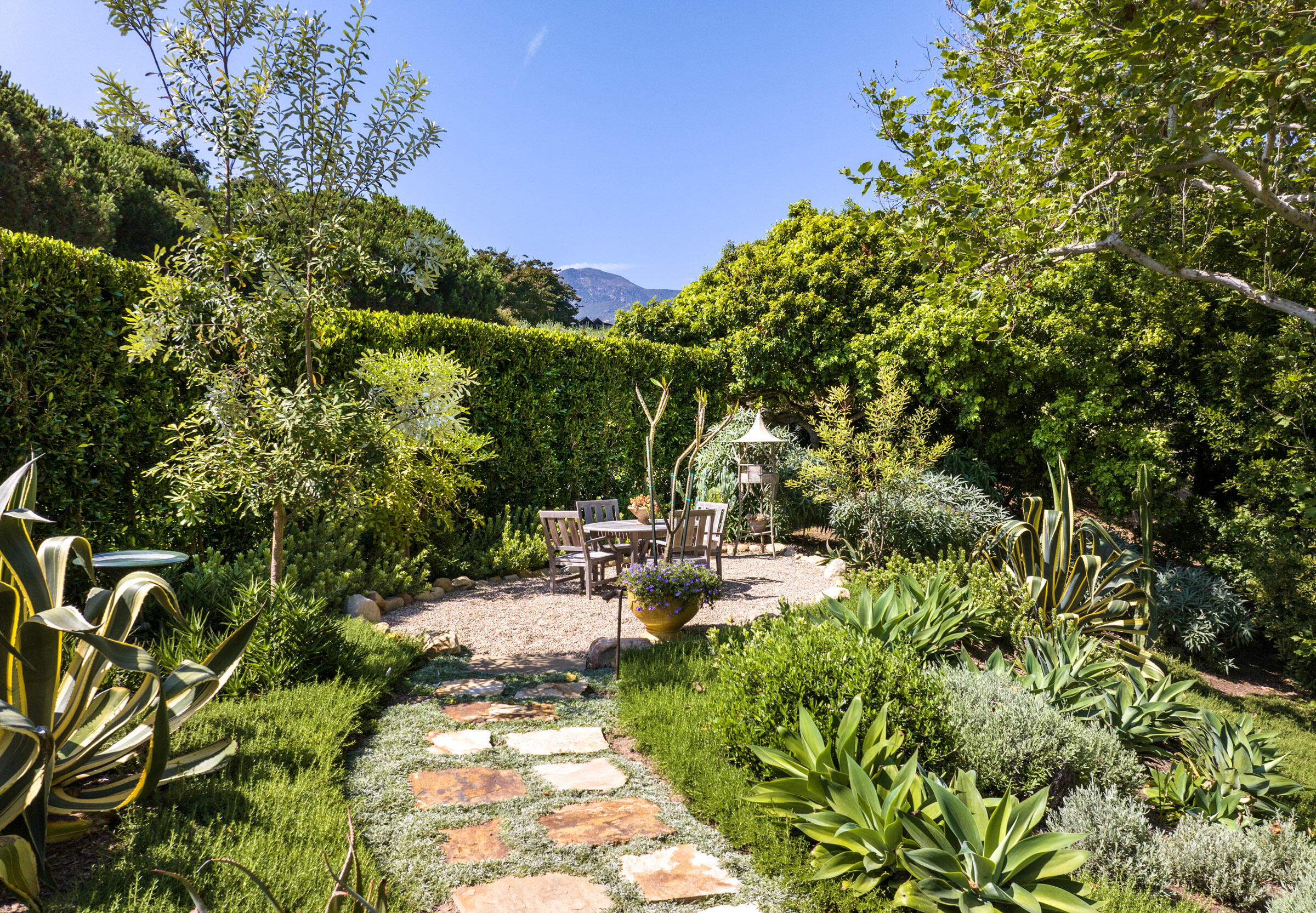 448 Court Place Montecito, CA 93108 - Photo 29 of 33 a view of swimming pool with lawn chairs and plants