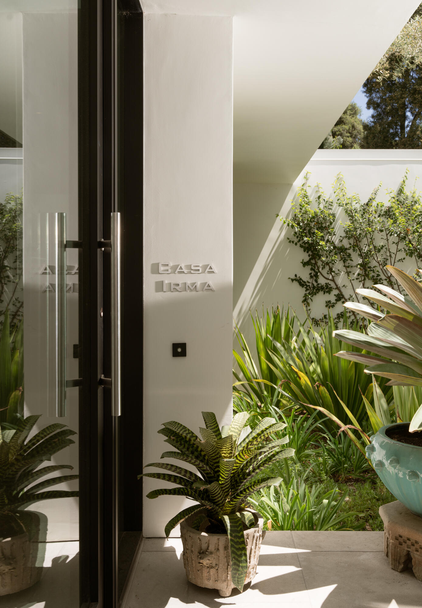 448 Court Place Montecito, CA 93108 - Photo 5 of 33 a potted plant sitting in front of a door